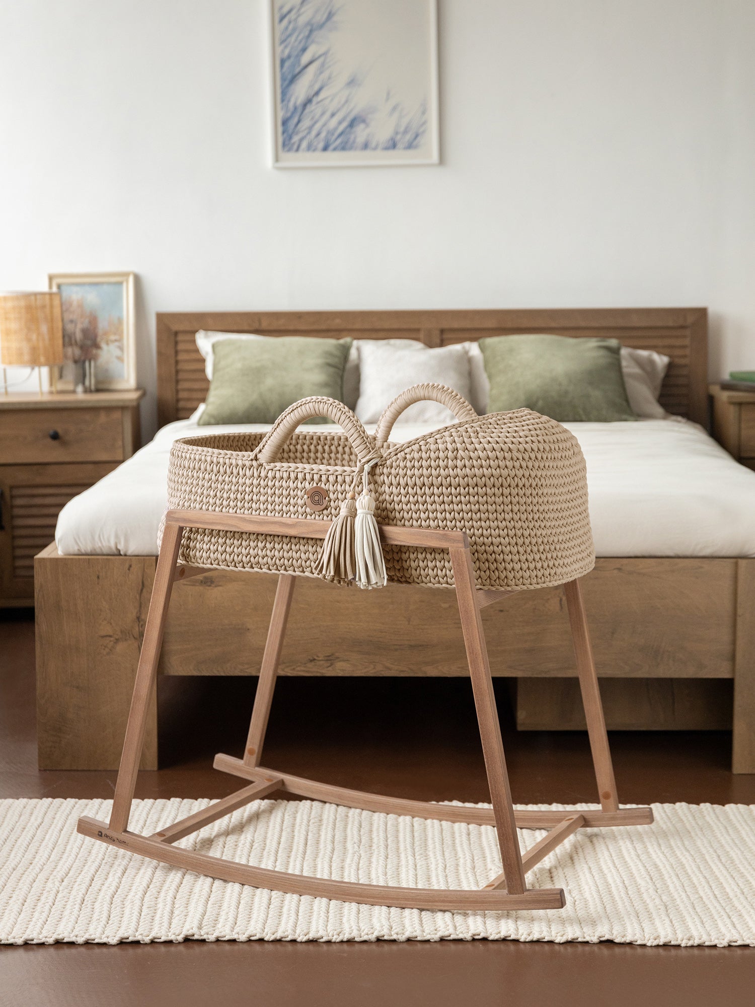 Sage green XL Moses basket with round hood on a wooden rocking stand – Anzy Home
