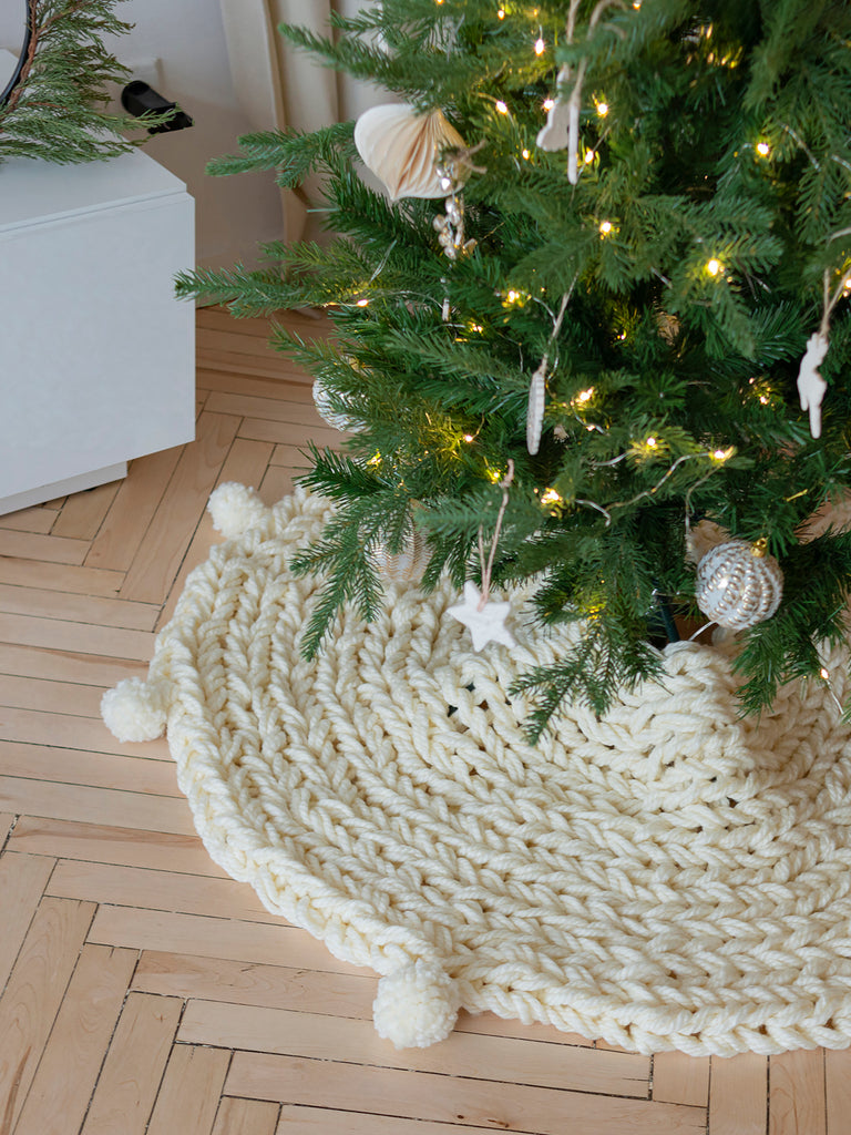 Cream knitted Christmas tree skirt with pompoms
