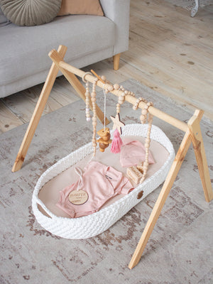 Ivory crocheted baby changing basket on a wooden stand – Anzy Home